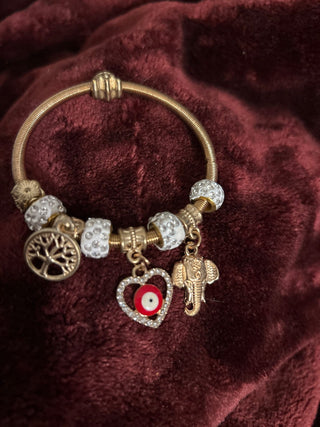Gold dangle costume bracelet MTS
