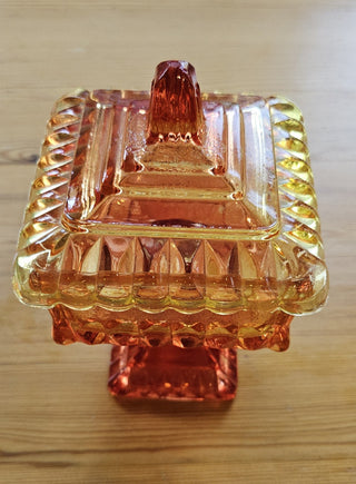 Vintage Jeannette Amberina glass "Wedding" candy dish Square-shaped candy dish with a matching lid and a pedestal base. RSV|106957