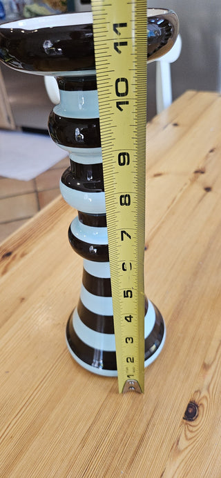 11" Tall candle holder/pedistal distinctive striped pattern in brown and light blue, with a stacked, rounded, and tapered shape.  RSVL|111553
