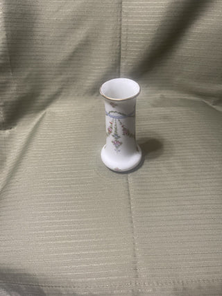 small white vase with pink flowers rsv