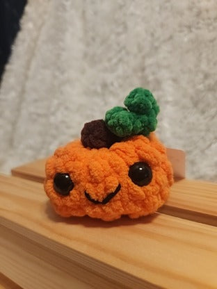 Medium Happy Pumpkin: Crocheted. Orange, brown, green, black