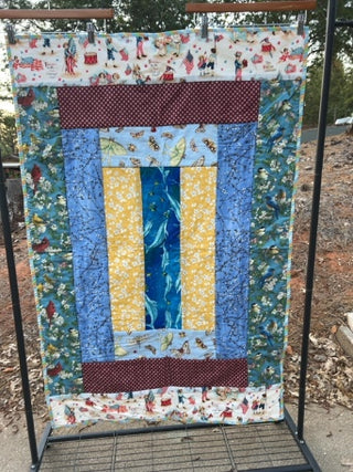 Handmade children’s quilt or tummy pad
