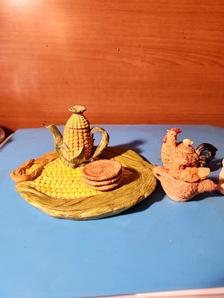 Two miniature teapots with tray, small plates and farm animals