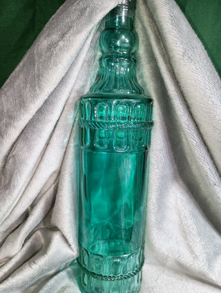 Teal glass bottle