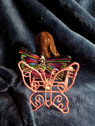 Colorful fairy with butterfly bench