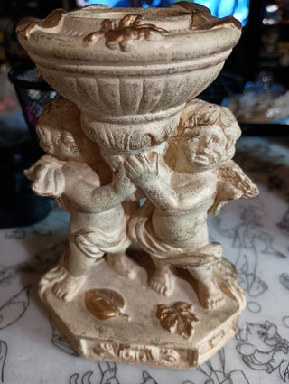 Vintage cherub candle holder