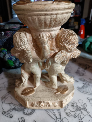 Vintage cherub candle holder