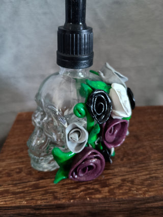 Glass skull and roses bottle (purple flowera)