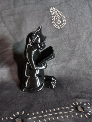 3-D black Cat w/ a book