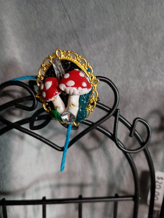 Mushroom and crystal pin with a gold back