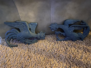 Battling pair of cast iron chickens