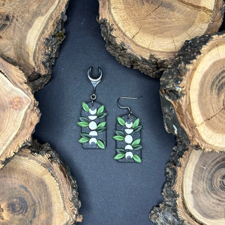 Thin arch glittery black moon phase leaves earrings|42100