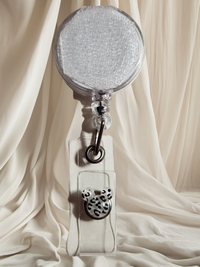 Belt Clip Interchangeable Badge Reel with Retractable Reel. Badge Button: Black Cheetah Print Mouse Head. Our Interchangeable Badge Reels are made to be used with our Interchangeable Badge Reel Charms.|63709
