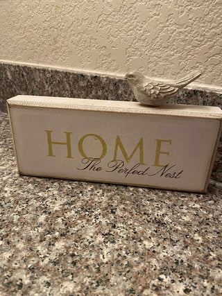 Home sign with bird
