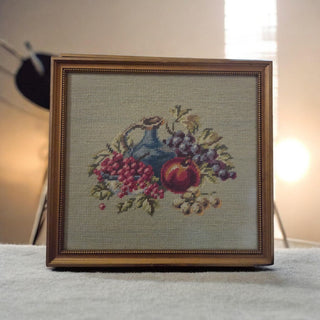 Vintage Needlepoint Art Framed Fruit Pitcher Scene 12" h x 12 3/4" w  Goldtone and wood frame
