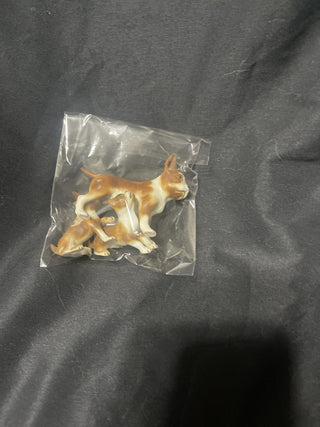 three small ceramic dogs rsv