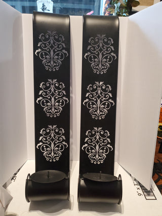 2 black metal wall sconces