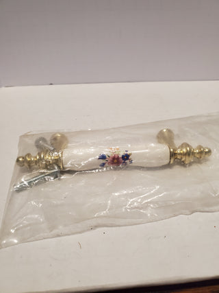 Gold and porcelain floral drawer pull