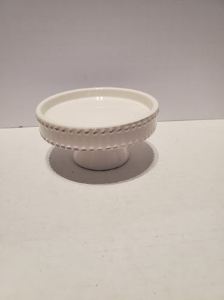White candle pillar pedestal