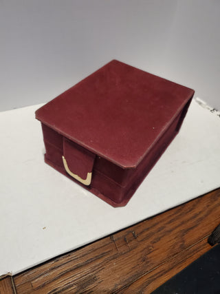 Burgundy velvet jewelry box from Derco Jewelers