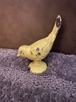 Yellow cast iron bird