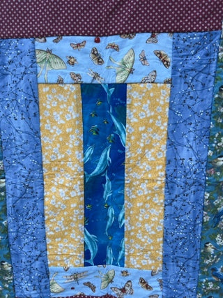 Handmade children’s quilt or tummy pad