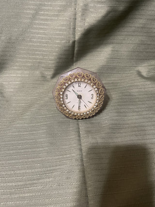 small pink clock rsv