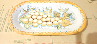 Italian Vineyard Tray
Hand-painted ceramic with warm golden grape motif.
Lovely for kitchen styling or serving.
10.5" x 6"