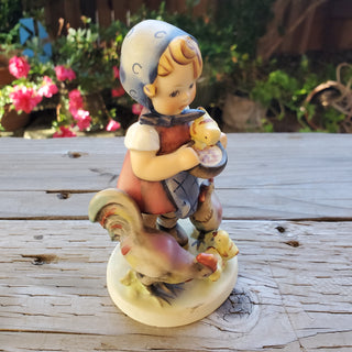 Goebel Hummel Figurine Feeding Time