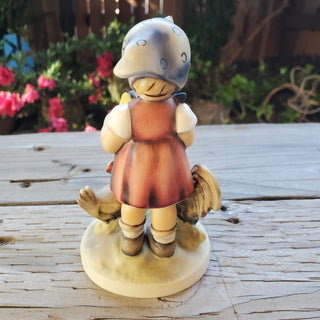 Goebel Hummel Figurine Feeding Time