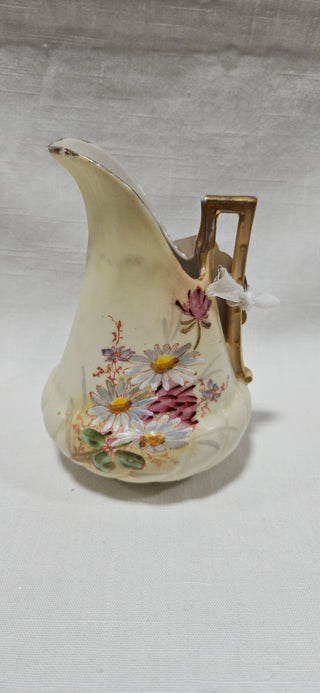 Antique Floral Porcelain Ewer
Hand-Painted · Gilt · c. 1900