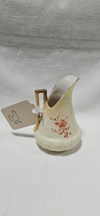 Antique Floral Porcelain Ewer
Hand-Painted · Gilt · c. 1900