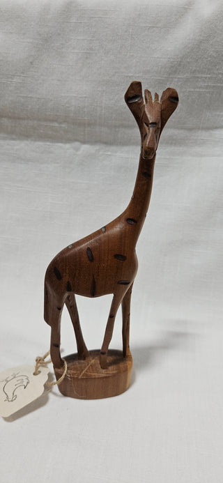 Hand-Carved Wooden Giraffe
Solid wood figurine