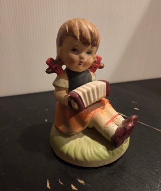 Girl with Accordion Figurine