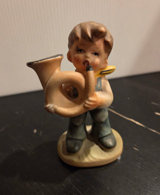 Boy Playing Horn Figurine