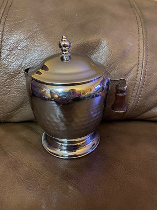 Small chrome creamer with lid