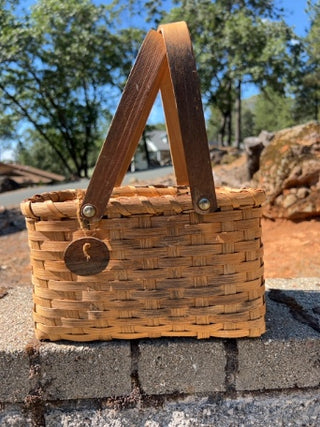 handcrafted basket wooden swinging handles