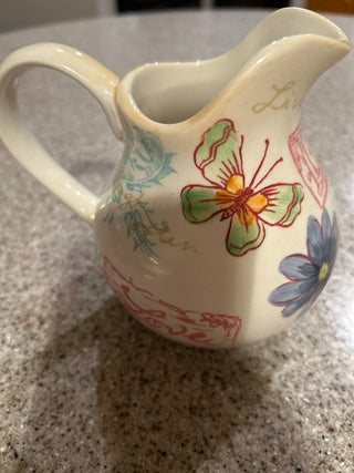 Small floral ceramic pitcher