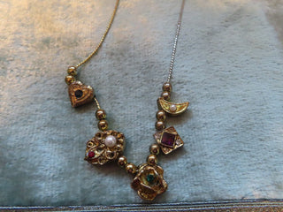 Gold tone necklace with slider pendants RCD|134442