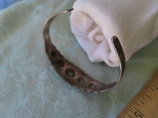 Silver tone cuff bracelet w/conchos RCD|122502