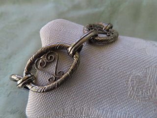 Silver tone round link bracelet RCD