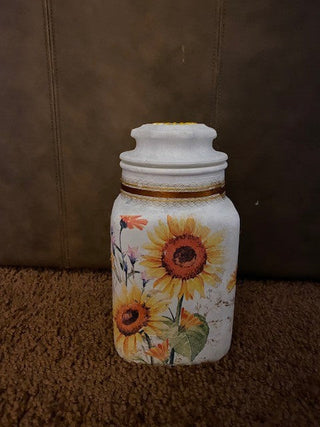 Daisy decorated white glass jar