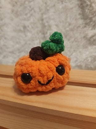 Medium Happy Pumpkin: Crocheted. Orange, brown, green, black
