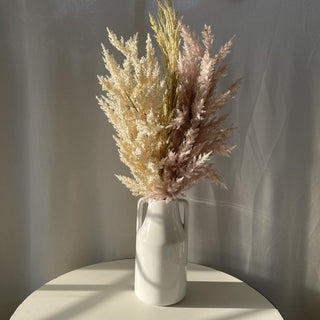 White ceramic vase w/ pastel foliage RSV