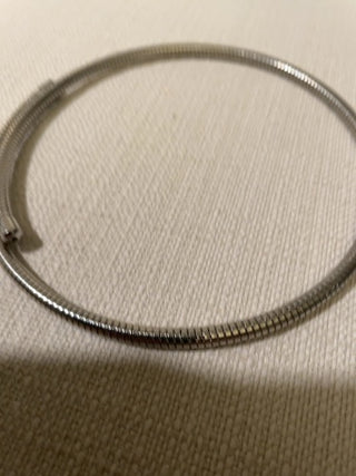 Silvertone choker style spring necklace