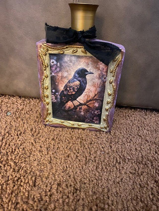 Raven and owl decorated bottle