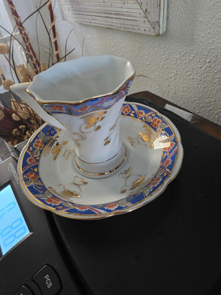 Miniature bone china cup and saucer|102346