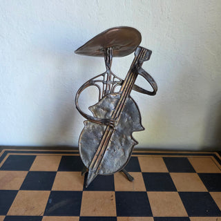 Copper Metal Man Playing Guitar