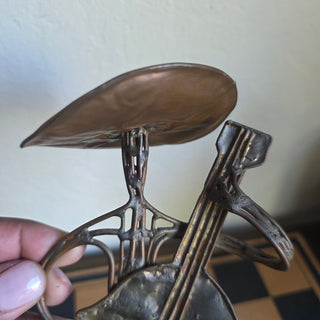 Copper Metal Man Playing Guitar