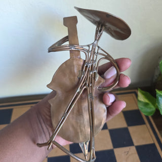 Copper Metal Man Playing Guitar
